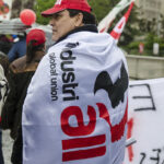 Igor Diaz, Sintracarbon education secretary at May day demonstration in Geneva, Switzerland