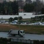 Roads leading to ports in Algiers are blocked with traffic following police barricades to prevent the union demonstration taking place. 