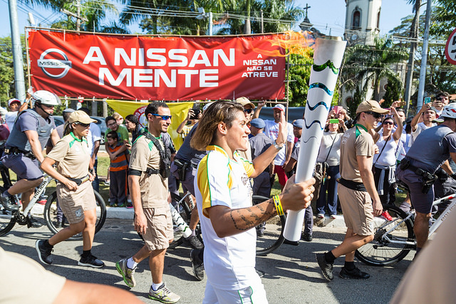 Brazilian unions protest during the torch relay