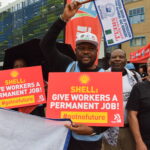 IndustriALL y afiliados de 12 países protestan frente al local en que se realizaba la JGA de Shell en La Haya, Países Bajos, el 22 de mayo.