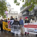 Unions protest against BHP outside the company's AGM in London.