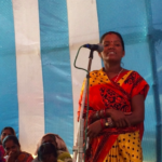 Displaced woman talking about hardships her community endures