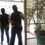 Security guards harassed international observers and retained their passports.