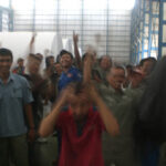 Indonesian paper workers celebrating victory
