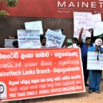 Workers demonstrate outside the Mainetti Mainettech factory in Sri Lanka