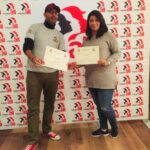 Two course participants from Morocco receive their diplomas