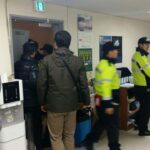 Police seize computers, equipment and documentation from KMWU offices. 