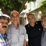 Reza Shahabi with comrades