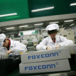Foxconn will replace 30 per cent of its production line workforce with robots by 2020. Photo credit: Reuters/Bobby Yip