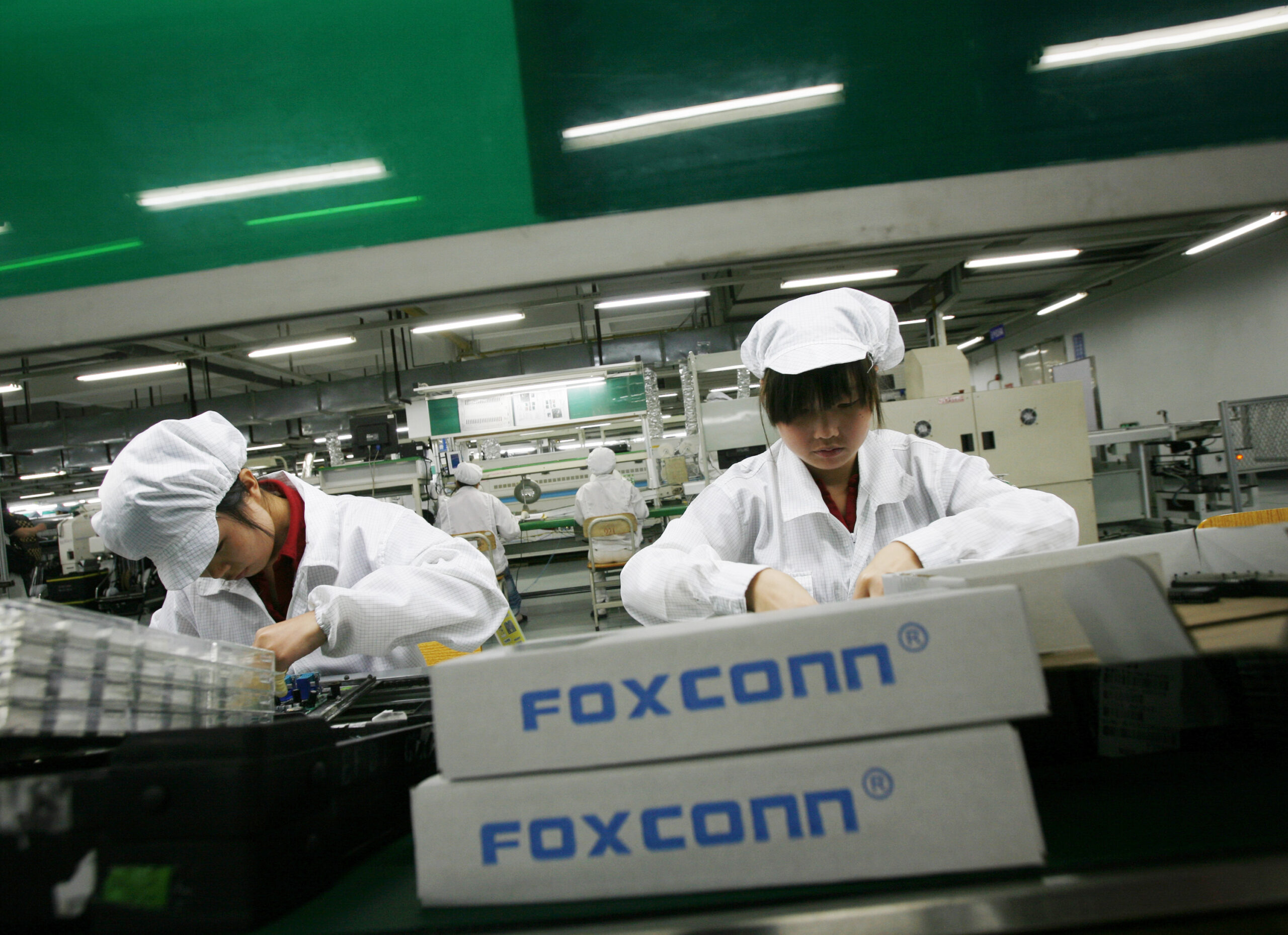 Foxconn will replace 30 per cent of its production line workforce with robots by 2020. Photo credit: Reuters/Bobby Yip