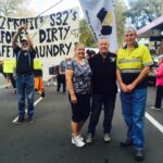 Dave McLachlan at a May Day rally, with his wife Joan and district secretary, Lee Webb. To the left is Dave’s workmate Brett Reeves