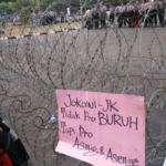 Barbed wire used to stop protestors in Jakarta at a demonstration in November, 2015.