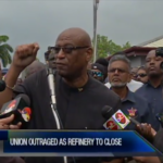 OWTU president Ancel Roget addresses the media after the announcement