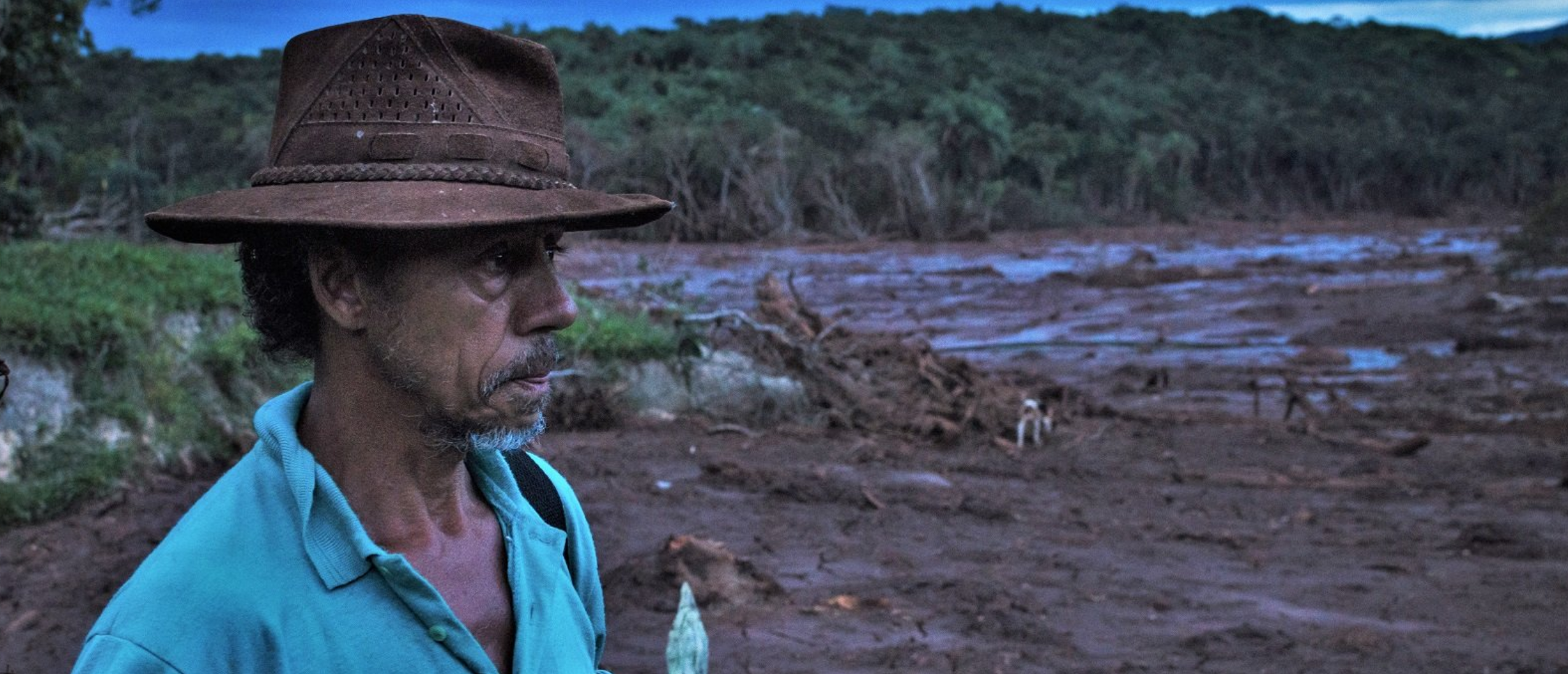 Two weeks after the dam burst, 53-year-old Ademilson Custódio recalls seeing dozens of people being carried away in the stream of mud that enveloped the farm he worked at near the town of Brumadinho. (Photo credit: Gustavo Basso)
