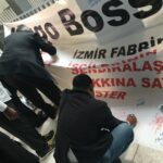 Делегаты подписывают плакат со словами солидарности работникам Hugo Boss в Измире.
