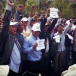 Union leaders address the public and crowd next to Freedom Park. Photo courtesy of LICADHO