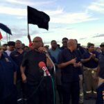 OWTU President General, Ancel Roget, announces his union's success in negotiating a pay increase for Petrotrin workers. Photo: OWTU