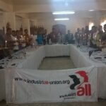 Participants in an IndustriALL workshop in the Malagasy capital, Antananarivo, mark 28 April, the International Day to Commemorate Dead and Injured Workers.